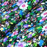 virágok - joyful meadows - meadow in black - designer pamutvászon méteráru