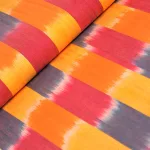 Kaffe Fassett artisan - ikat stripe in yellow - designer szövött mintás pamut méteráru